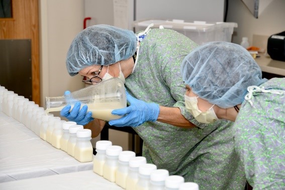 Milk Bank volunteer Susan Ginsberg and milk technician Brandy Blanchard process milk. The Milk Bank at Ochsner Baptist began from an Excellence Fund grant application submitted in 2015.